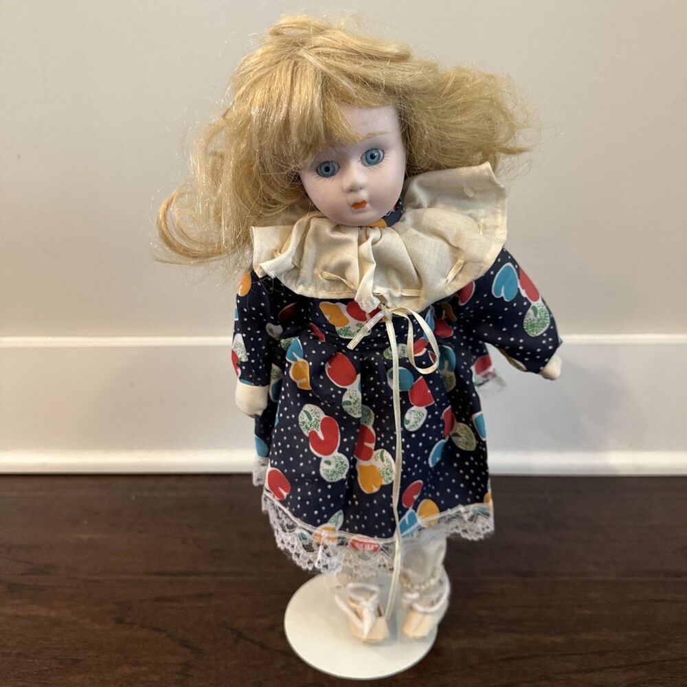 America's Dolls - Beautiful Porcelain Doll in Adorable blue and White Outfit.